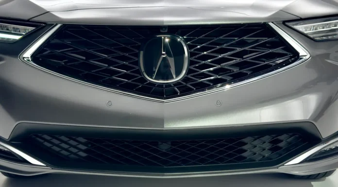 Acura Is Reportedly Working on a New Flagship SUV Positioned Above the MDX Acura MDX grille and badge - featured
